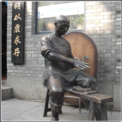 古代人物磨刀銅雕塑 古代人物磨刀銅雕塑